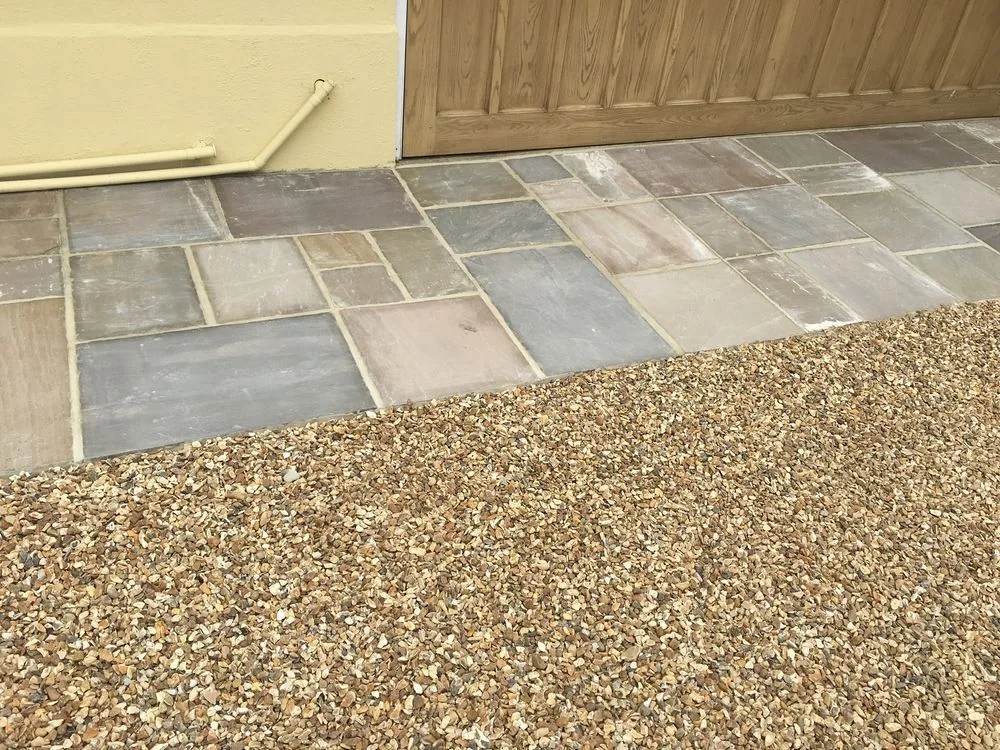 Patio and decorative shingle landscaping
